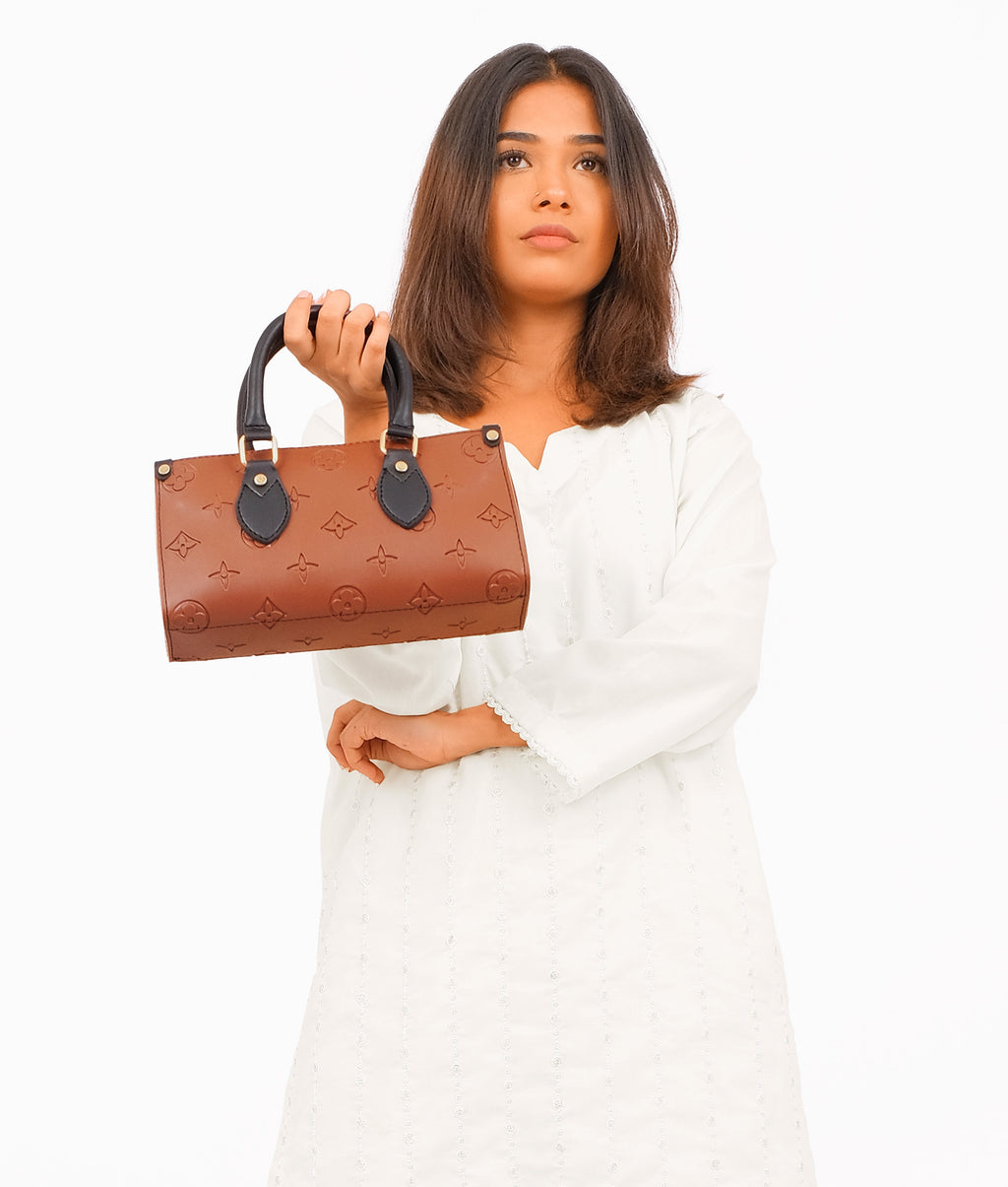 Brown and black on-the-go mini bag