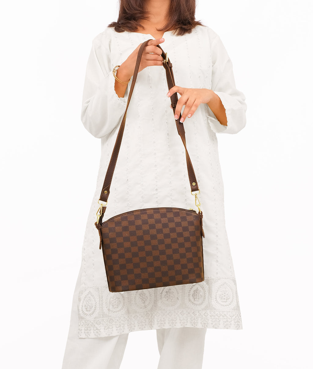 Dark brown checkered dome cross-body bag
