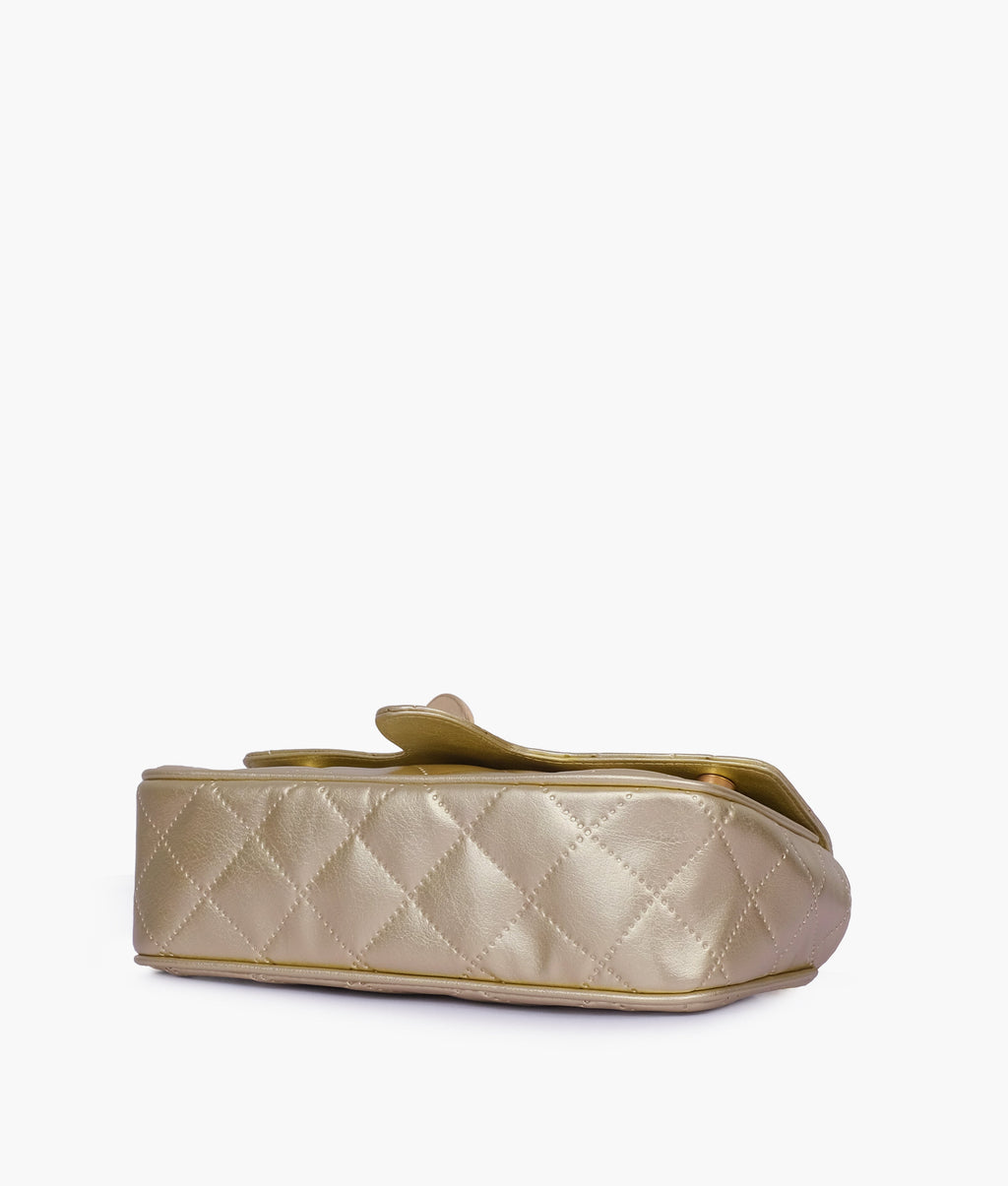 Golden quilted small shoulder bag with chain
